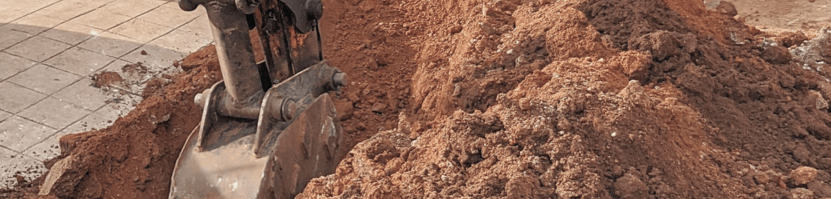 Снятие плодородного слоя почвы при строительстве